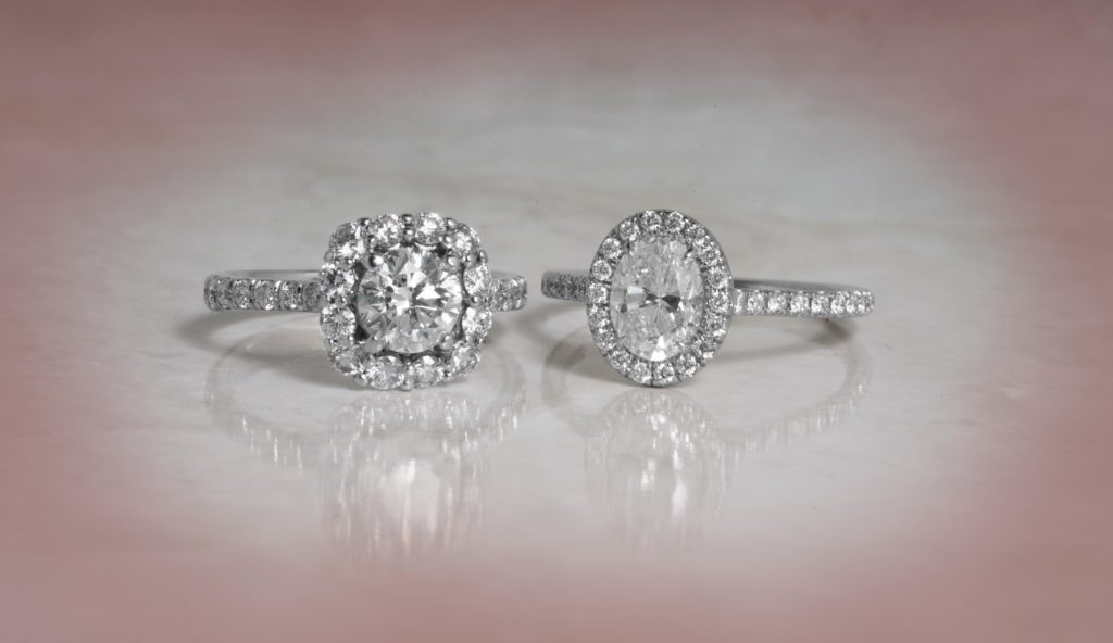 image of 2 halo diamond engagement rings