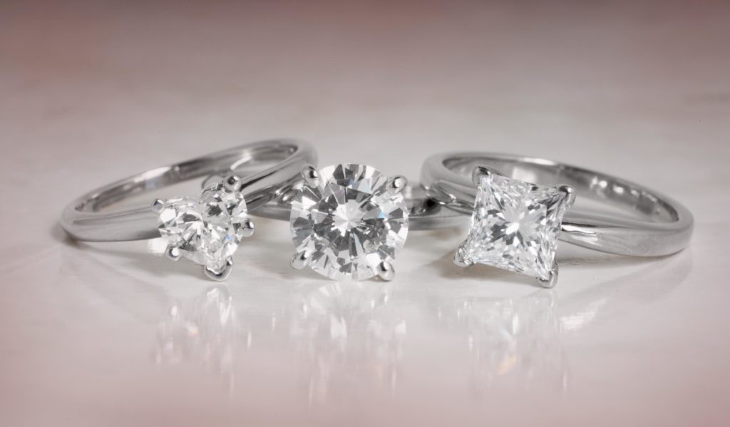 image of 3 diamond solitaire engagement rings