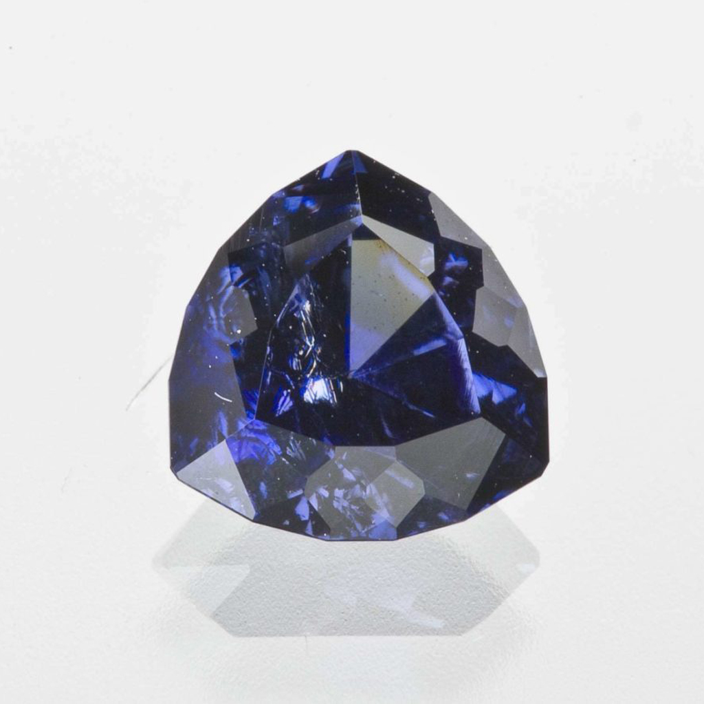 Loose trillion cut benitoite gemstone.