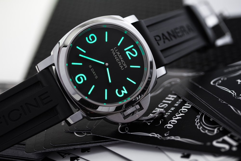 Stainless steel Panerai Luminor with a black rubber strap.