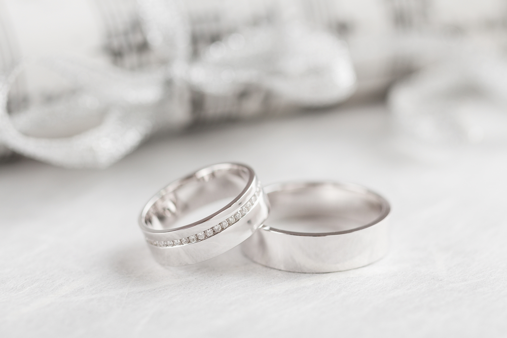 Two white gold wedding bands.