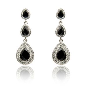 White gold drop earrings centered with black pear cut diamonds surrounded by white diamond haloes.
