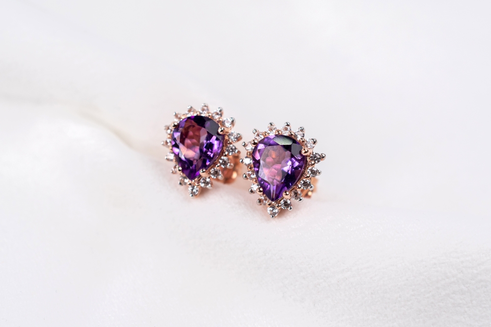 Rose and white gold pear-shaped amethyst and diamond stud earrings.