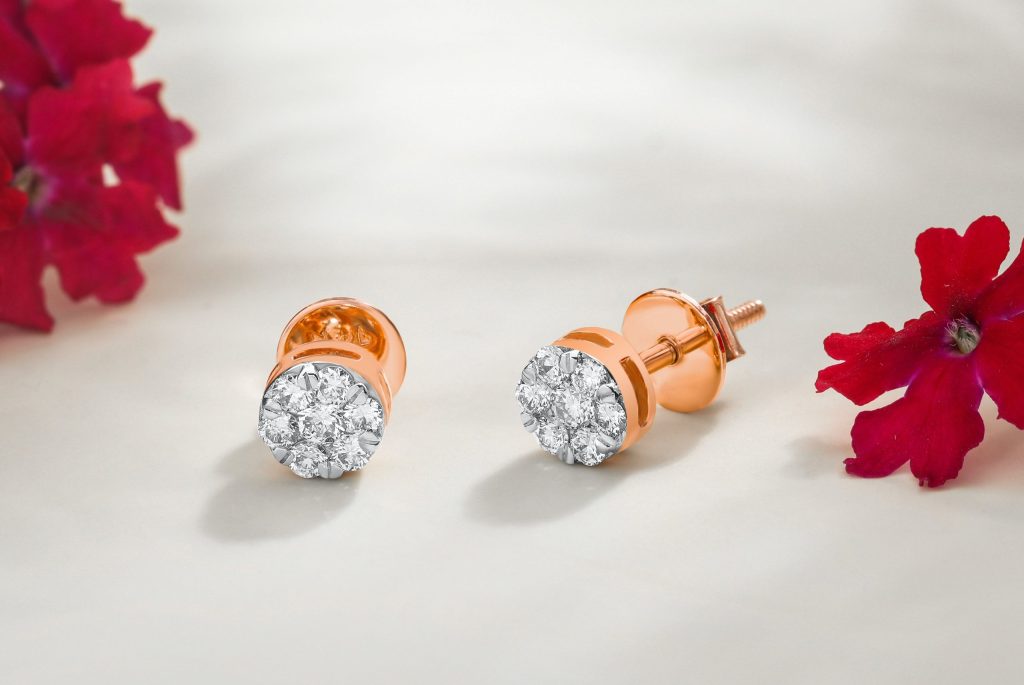 Rose gold diamond stud earrings.