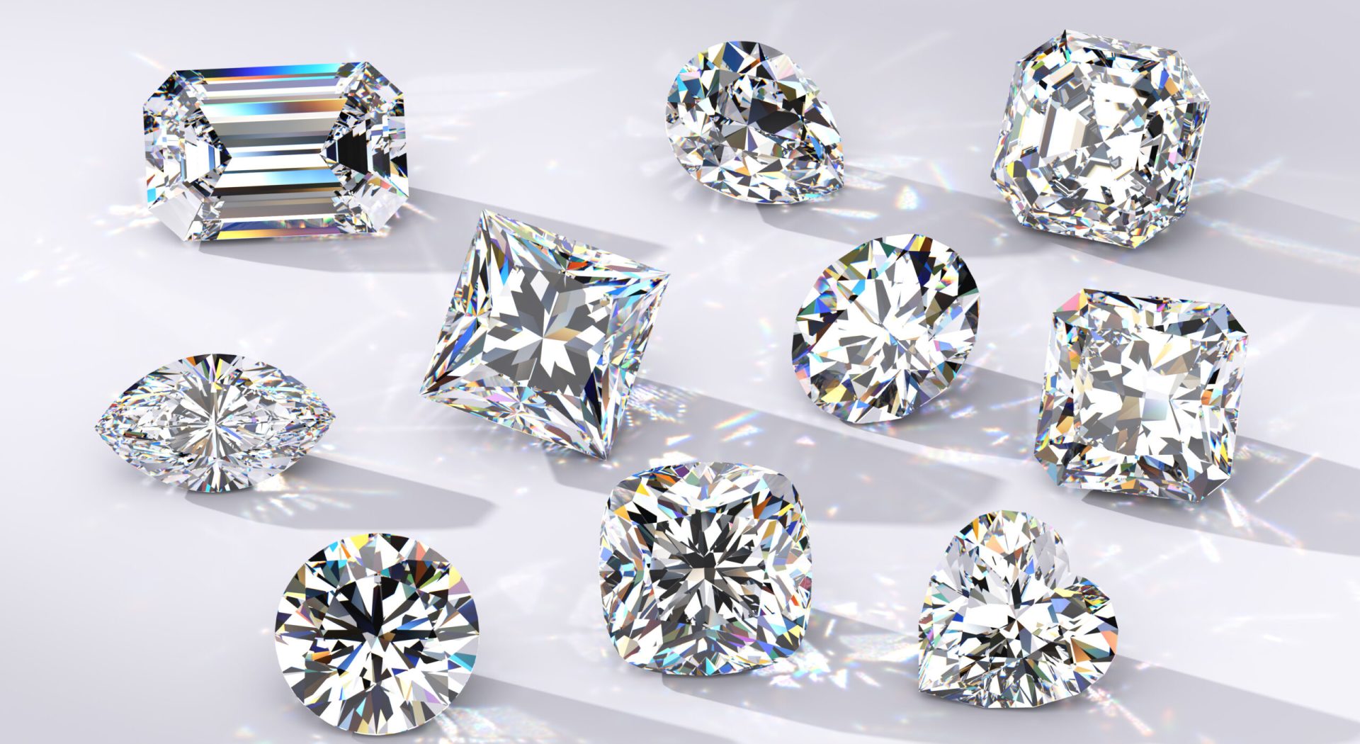 Ten diamond in various cuts including, emerald, pear, asscher, marquise, princess, oval, round, and heart.